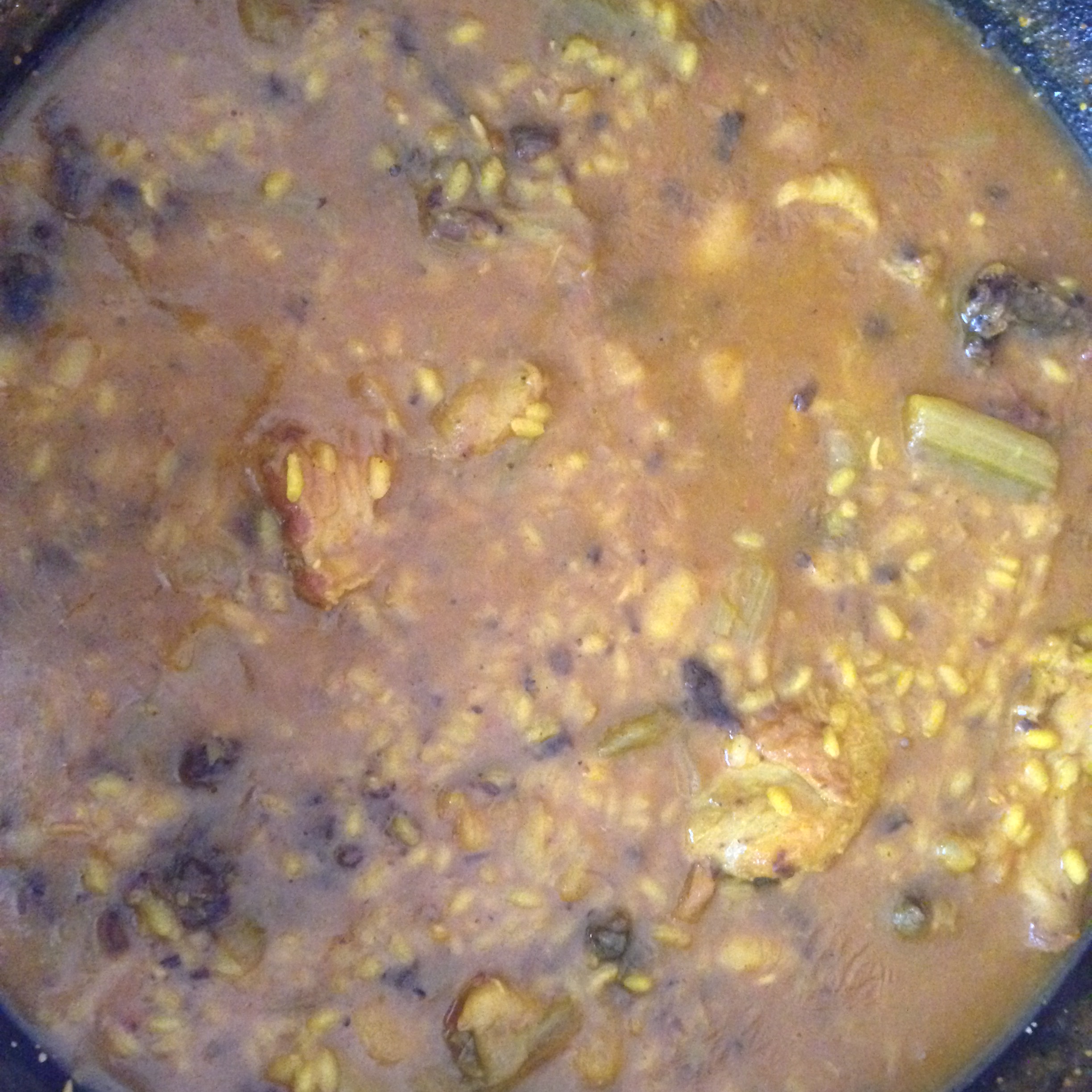 Arroz meloso con pato, cardos y morcillas