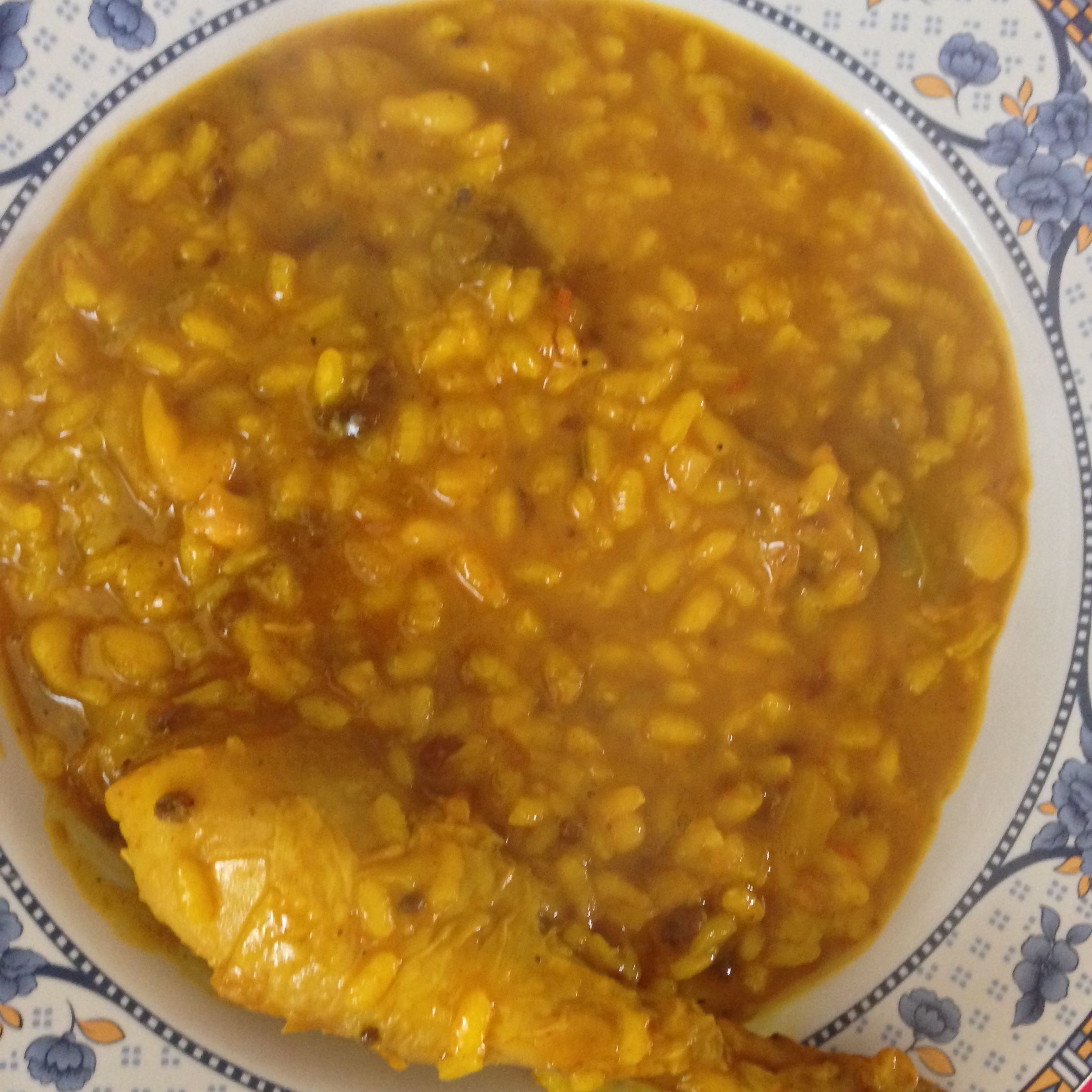 Arroz meloso de pato, cardos, alubias y morcillas