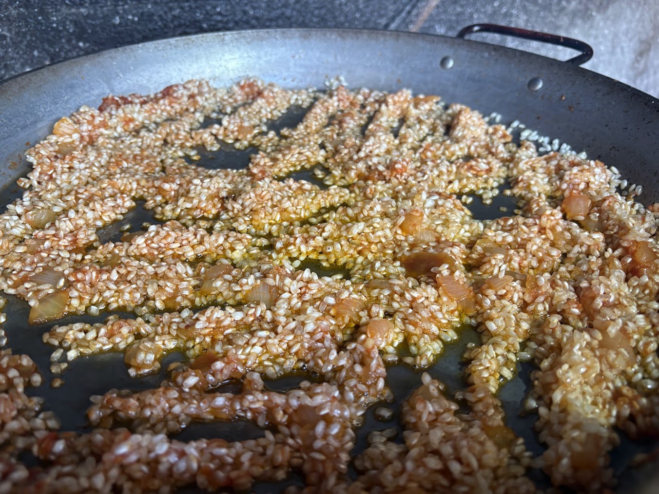 Arroz cubierto con caldo de cocido